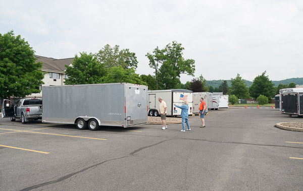 Trailers are settled onto a campus parking lot for their weekend stay.