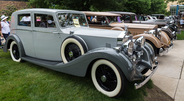 A 1936 25/30 light saloon owned by Tom Wright, of Sneads Ferry, N.C., fronts a stately row of Rolls-Royces. 