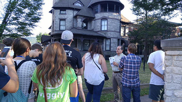 Local architect Anthony H. Visco Jr., an alumnus of Williamsport Area Community College and member of Penn College's Architectural Technology Advisory Committee, leads students on a walking tour of Millionaire's Row.