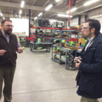 A tour of the ESC with Justin W. Beishline (left), assistant dean of transportation and natural resources technologies.