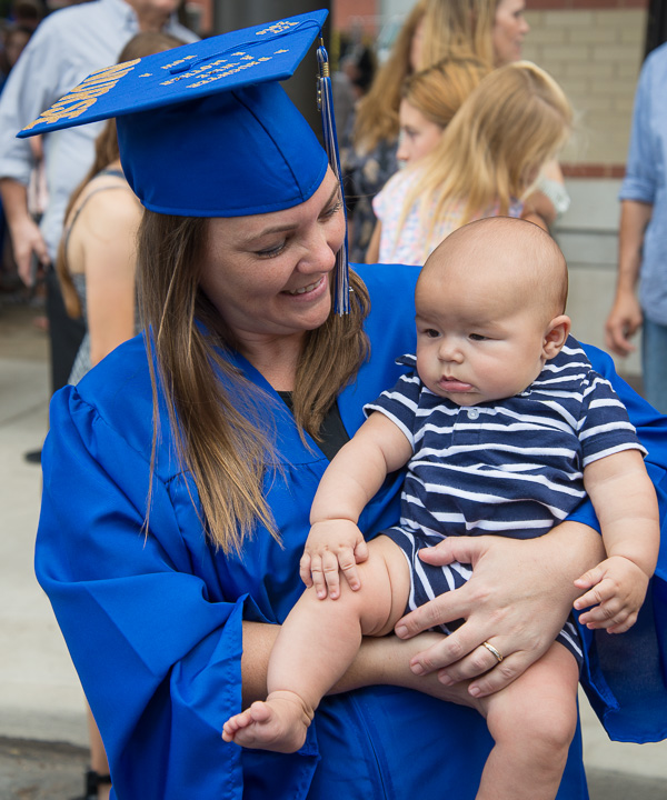 Devin L. Beaver, who earned an associate degree in health arts: practical nursing emphasis, savors the day with her darling nephew. 