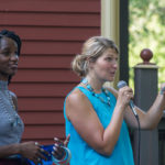 Marceline Y. Salomon-Debrosse (left) and Katie L. Mackey call out winning numbers for prize giveaways. 