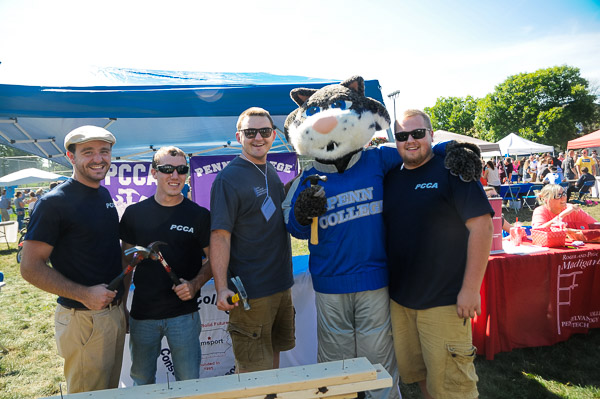 Members of the Penn College Construction Association accept their favorite mascot into the club.