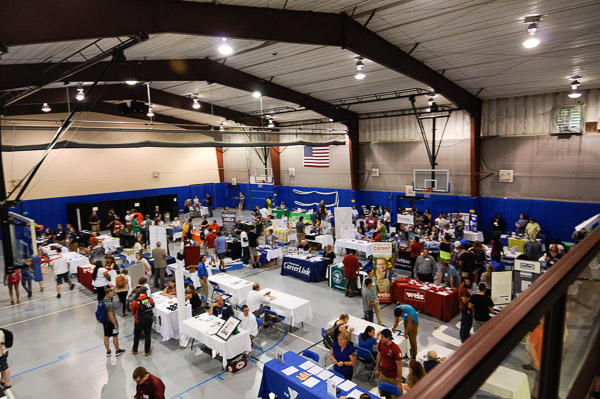 Vendors and students seeking employment find common ground in the Field House during the Part-Time Job Fair.