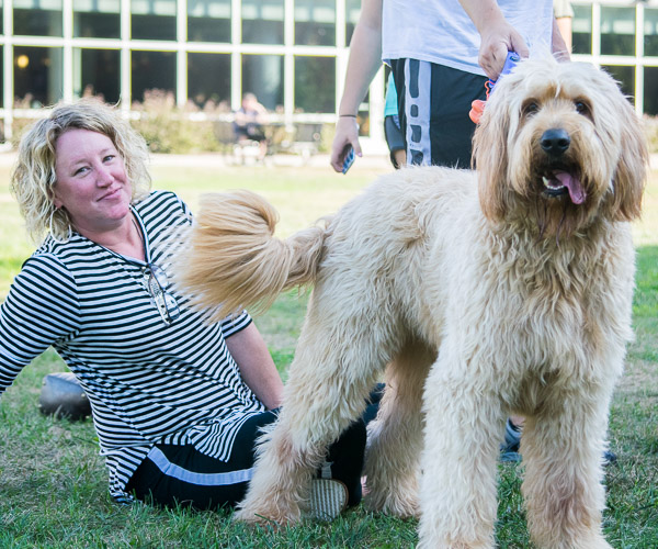 Crissy L. McGinness, director of dining services, and her Goldendoodle named Roscoe