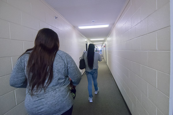 LaShawn C. Hayward leads daughter Jazmine S. Booker down a soon-to-be-very-very-very-familiar hallway. A first-year early childhood education major, Booker is from Oxon Hill, Md.