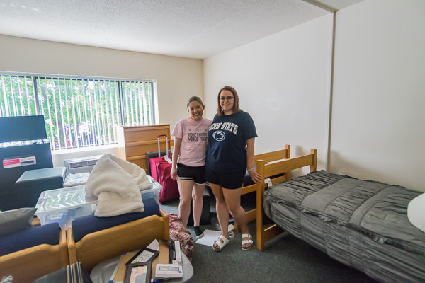 Juniata Hall roommates Emma C. Kurshan (left), a pre-dental hygiene major, and Emily D. Moose, a pre-surgical technology student  – both from Red Lion – settle into new surroundings.