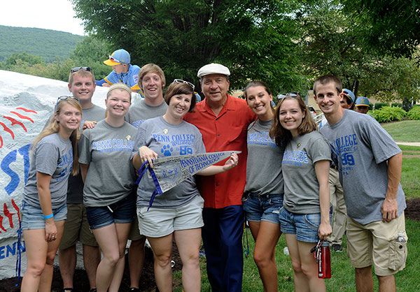 A pennant-worthy group of campus volunteers shares a memorable moment with a Hall of Famer.