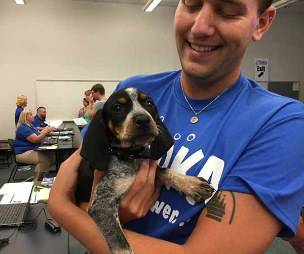 Adding some welcome waggin' to the proceedings, young Zoe was a hit during check-in at College Avenue Labs.