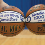 Jamie and Kierstin Steer show off record-setting game balls.