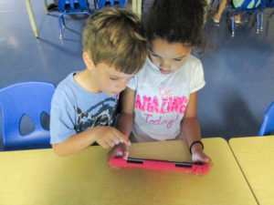 Children design a toy using a kid-friendly design app. Their toys would later be produced on 3-D printers.