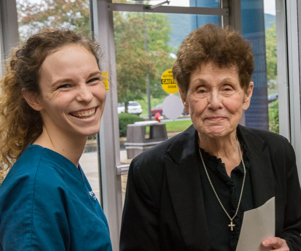 Way greets Mary Facey, the first administrative assistant for the college’s Dental Hygiene Program, which made its first home on the fourth floor of the Academic Center.