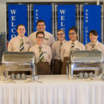 A mix of Le Jeune Chef Restaurant waitstaff and hospitality management students stand ready to serve authentic Oktoberfest fare. From left: Amber F. Buck, Jennifer A. Moyer, Denis V. Younken, Crystal L. Harker, Noeiris Pliego and Taylor M. Barrett. 
