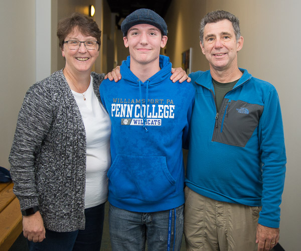 David A. Pfahler, a freshman in plastics and polymer engineering technology, enjoys time with his parents who traveled to campus from Telford. 
