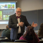 The speaker visits Cooley's Introduction to Cultural Anthropology course in the ACC earlier in the day, conversing with students and gaining a better understanding of the college. (Sojka also spent an hour with Craig A. Miller's World Civilization class down the hall.)