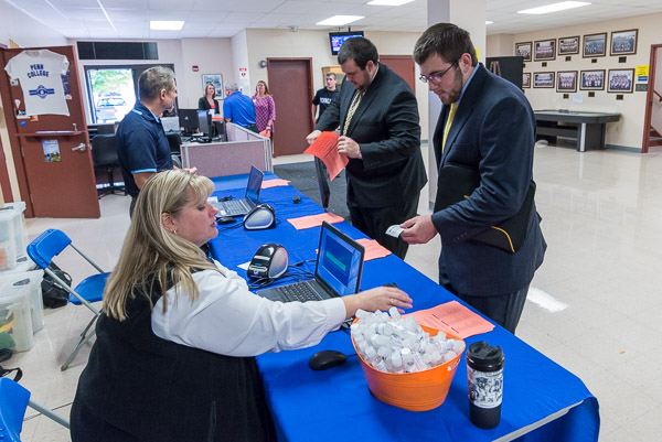 Shawnalee E. Hughes, Career Services secretary, makes the check-in process smooth and efficient.