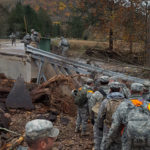 Boots on the ground: The National Guard brings helping hands and a powerful sense of security to a flood-stricken neighborhood.