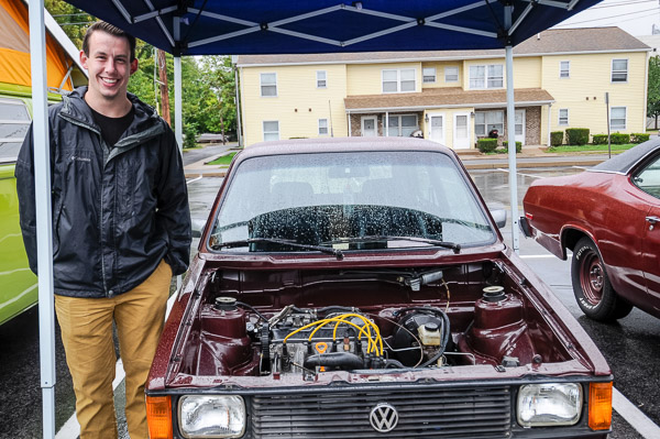 Paul M. Lasell, a plastics and polymer engineering technology student, shows off a car he 