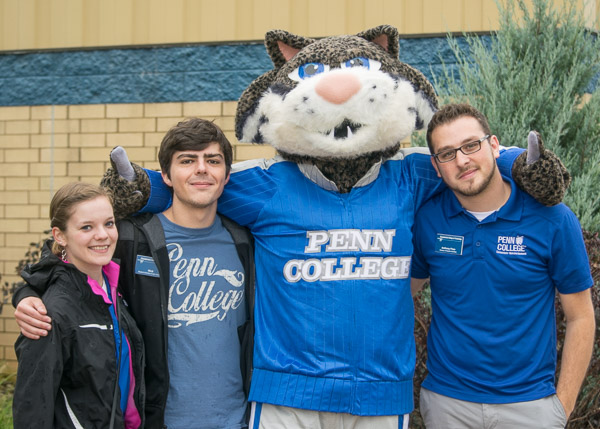 Anthony J. Pace (right), the college's new director of student activities, with student leaders Alexandra M. Lehman and Nicholas V. Walker, and a phenomenal feline VIP. 