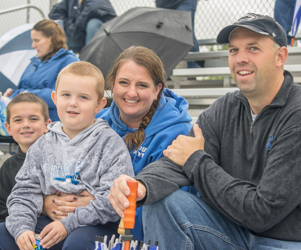 Biology instructor Tammy A. Miller catches the Saturday soccer action with husband Nathan D., a 1999 graduate in plastics and polymer technology, and sons David and Nate.