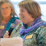 Meredith Eachus Armstrong, who curated the show and is among the exhibitors, talks with the crowd.