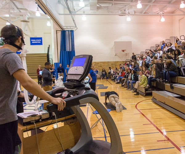 Students and faculty from the Exercise Science Program provide a full roundup of fitness assessments for a crowd of more than 150 high school students, including a “VO2 peak” calculation on a treadmill to show cardiovascular fitness and impressive barbell deadlifts.