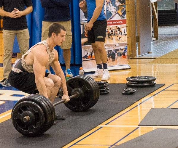 Logan C. Monta, an exercise science student from New Alexandria, lifts 400-plus pounds in a demonstration of a maximal strength test. He later lifted 500 pounds.
