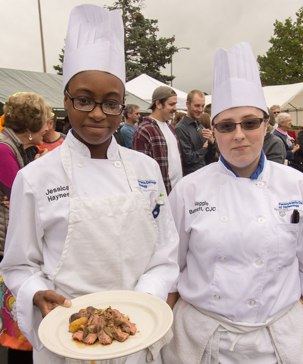 Jessica T. Haynes (left), of Bethlehem, and Magdalen C. Bennett, of Erie, show their dish, a Delmonico steak with balsamic bacon coleslaw and purple potatoes.