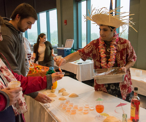 Culinary arts and systems student Austin B. Ovens, of Elizabethtown, serves his “Tropical Tonic”: pineapple juice, watermelon syrup and fruit punch sorbet.