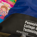 Picture books and Penn College backpacks are among items donated by the campus community for the remote village.