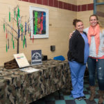 Gathering donations are veterans Mallory C. Maurer (left), nursing, of Towanda, and Jennifer L. Nicholson, applied health studies: radiography concentration, of Lock Haven.
