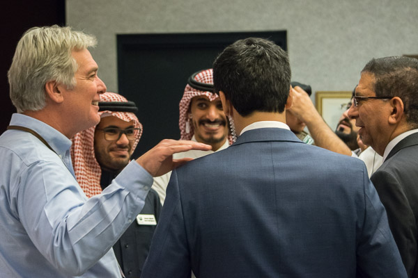 Timothy E. Weston (left), associate professor of plastics and polymer technology, attends in support of plastics students from Saudi Arabia.