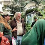 The Class of 2010's Alyssa B. Richner talks with Dennis P. Skinner, assistant professor of horticulture, in the new Hershey Gardens conservatory ...