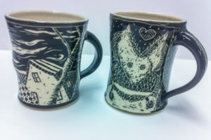 Two of the mugs to be auctioned at the ceramics exhibit at The Gallery at Penn College