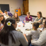 Staff and students from Scotland, Guam and across North America converse over dinner.
