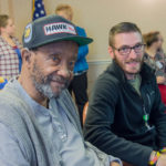 Rose View resident Joseph Bolden, a Navy veteran, and employee/Army veteran Jeff Fenstermacher chat during the event.