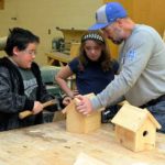 Whitmyer, who is also an assistant coach for the Wildcat baseball team, helps a young carpenter channel his determination.