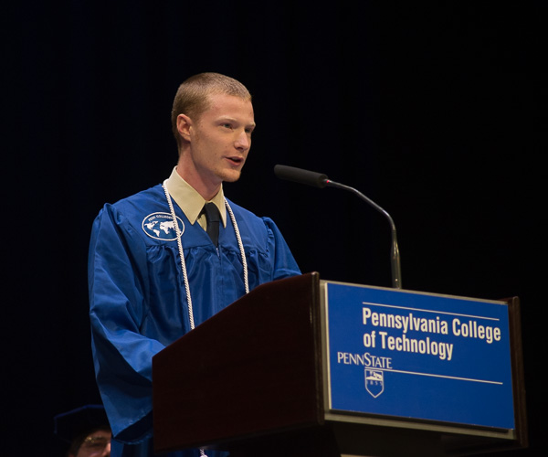 Cartmell regales the audience with tales of his first semester – when he managed to succeed in his classes (and at dining) despite two broken arms. He urged each of his fellow graduates to “be a contributing member of society.” 