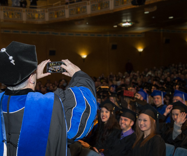The president takes a final photo of the Fall 2016 graduates. 