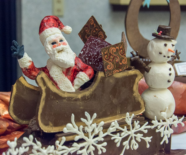 Santa waves from his sleigh in a chocolate sculpture by Paul J. Herceg.