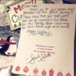 Admissions Representative Sarah R. Shott spearheads the holiday card-signing, enlisting college co-workers to share positive and personal messages to U.S. troops.