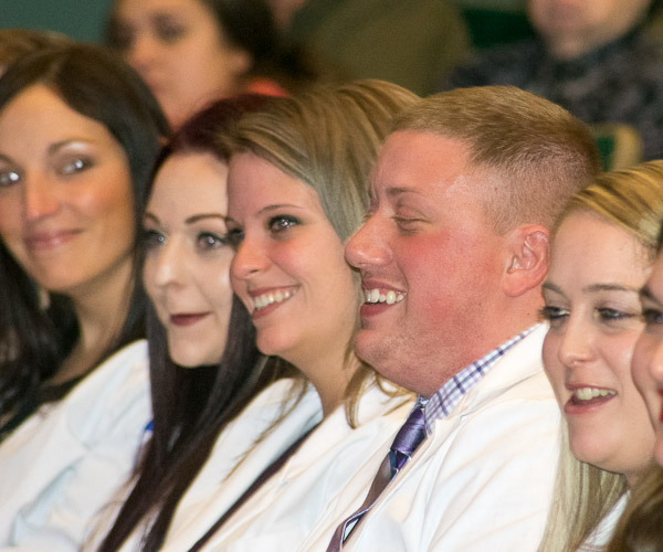 Nursing students chuckle at comments made by their chosen student speaker. From left are Courtney Kaster, of Lock Haven; Jocelynn M. Heichel, of Millerstown; Alexandra R. Harriman, of Montoursville; Chad R. Guiswite, of Loganton; and Emily B. Frymoyer, of Mifflin.