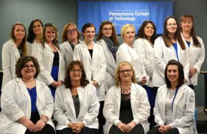 Fourteen students graduated Dec. 15 from the Practical Nursing Program at Penn College at Wellsboro. Front row (from left): Marie L. Andrews, Lori A. Laubenstein, Jami N. Andrews and Megan M. Legerlotz. Back row (from left): Sarah A. Blass, Kayre Piaquadio, Adrienne M. Foresman, Kathy Simmons, Emma L. McCleary, Haley A. Henry, Charlene Jones, Lori A. Cummings, Sheenah E. Pellicano and Melissa A. Lehman.