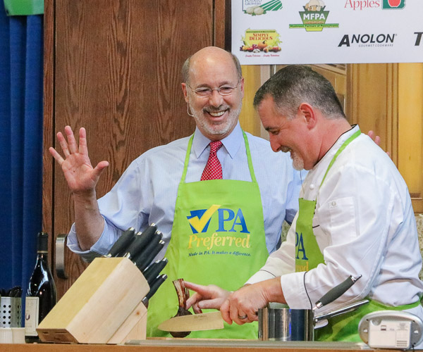 Among Farm Show demonstrators assisted by students were Chef Barry Crumlich (right), executive chef of the governor’s residence, and Gov. Tom Wolf.
