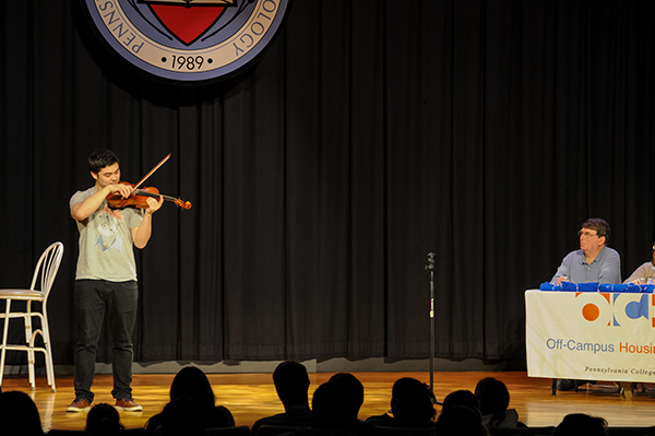 Violinist Christian T. Connolly, information technology sciences-gaming and simulation student from Montoursville