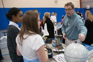 Pennsylvania College of Technology physics professor David S. Richards uses visual aids to talk about past U.S. space missions during a previous Science Festival at the college.