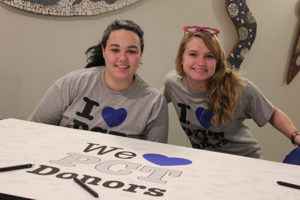 Jordan C. Bozzelli (left), of Worthington, a business administration: marketing concentration student, and Lauren J. Crouse, an applied human services major from Turbotville, encourage their fellow students' donor appreciation.