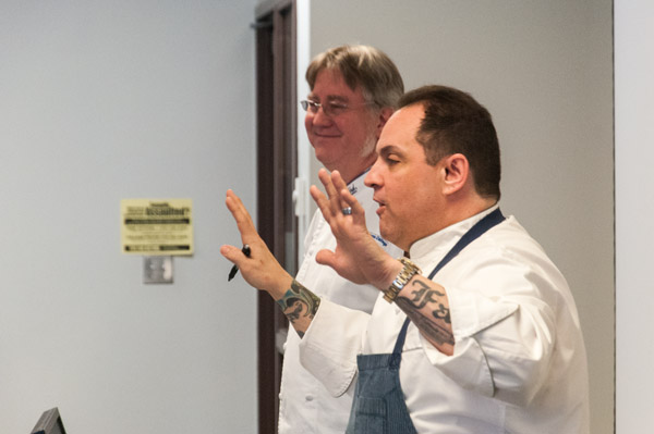 Tramonto offers his professional opinion to students in Chef Frank M. Suchwala’s Professional Event Planning course. Suchwala is associate professor of hospitality management/culinary arts.