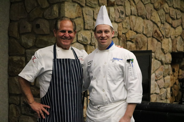 Folse takes a photo with culinary arts and systems student Robert E. Wood, of Williamsport. Wood is the 2017 recipient of the Chef John Folse Excellence in Hospitality Award. The award is presented each May to a graduating student who demonstrates Folse’s commitment to: being a positive role model for the hospitality industry; work and scholastic excellence; stewardship of personal and professional resources; respect for self and others; and sharing the hospitality department’s mission of exemplifying and promoting excellence, opportunity and leadership in hospitality education.