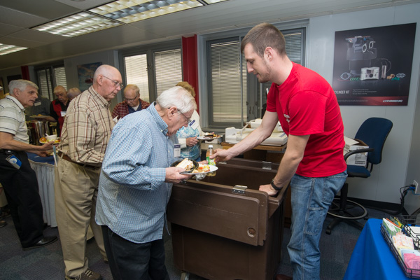 Staffing the beverage station is Jonathan R. Sutcliffe, an Army veteran and manufacturing engineering technology student. 